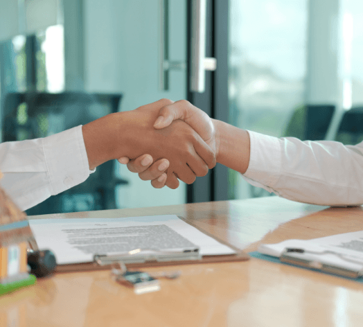 Business partnership handshake